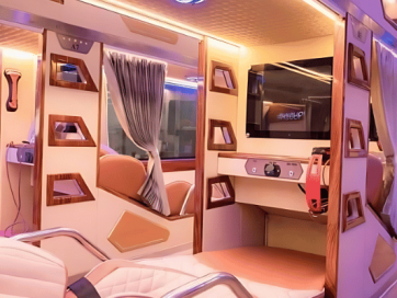 Queen Bus sleeper limousine amenities, including massage seats and free Wi-Fi.