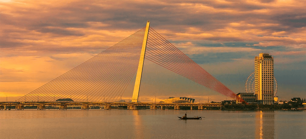 Hoàng hôn trên cầu Trần Thị Lý Đà Nẵng với bầu trời rực rỡ sắc cam Hoàng hôn trên cầu Trần Thị Lý Đà Nẵng với bầu trời rực rỡ sắc cam