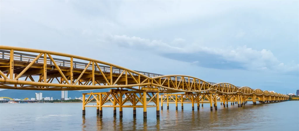 Panoramic view of the Nguyen Van Troi Bridge in Da Nang with its distinctive golden steel truss architecture